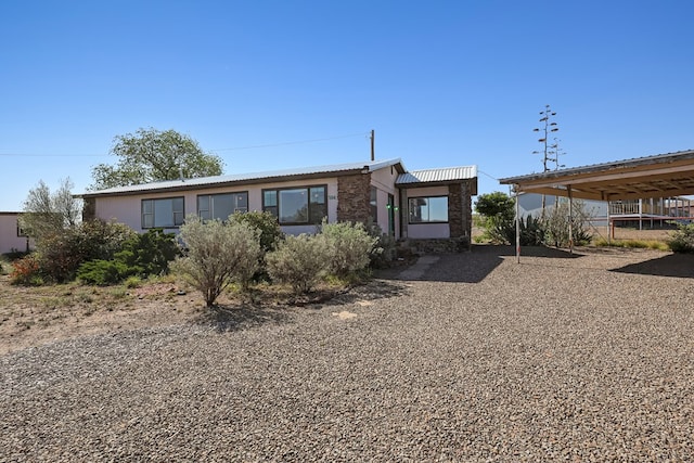 504 San Juan Dr, Fort Davis, TX 79734 - view of front of house featuring stone siding and stucco siding