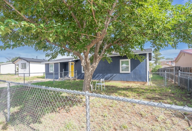 411 N San Jacinto St, Odessa, TX 79762 - view of front of house with a fenced backyard