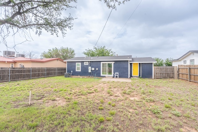 411 N San Jacinto St, Odessa, TX 79762 - rear view of property featuring a fenced backyard and a patio area