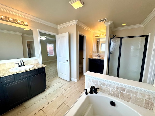 full bathroom with vanity, ceiling fan, toilet, ornamental molding, and shower with separate bathtub