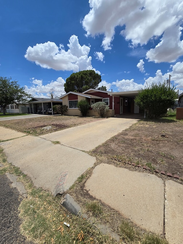 3207 Eastland Ave, Odessa, TX 79763 - view of front of property with driveway and a carport