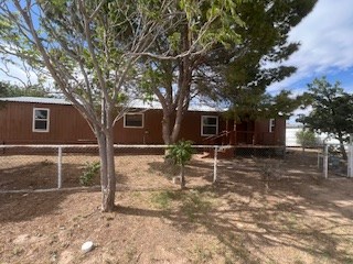 7720 W 26th St, Odessa, TX 79764 - view of front of home with a fenced front yard