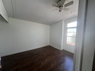 7720 W 26th St, Odessa, TX 79764 - additional living space featuring vaulted ceiling, dark wood-style flooring, and a ceiling fan