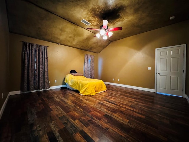 bedroom featuring visible vents, wood finished floors, and baseboards