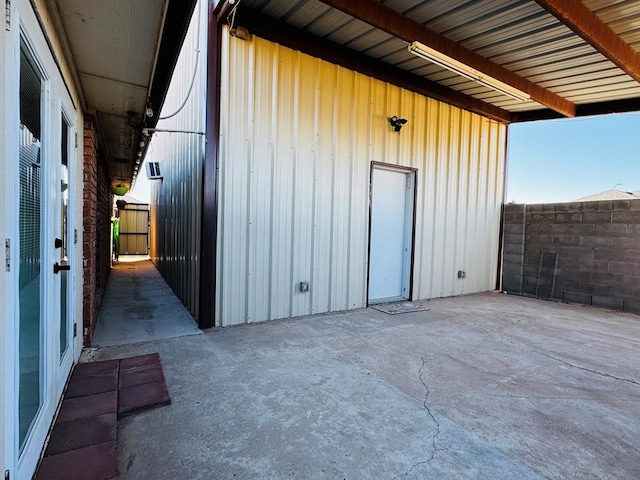 garage with fence