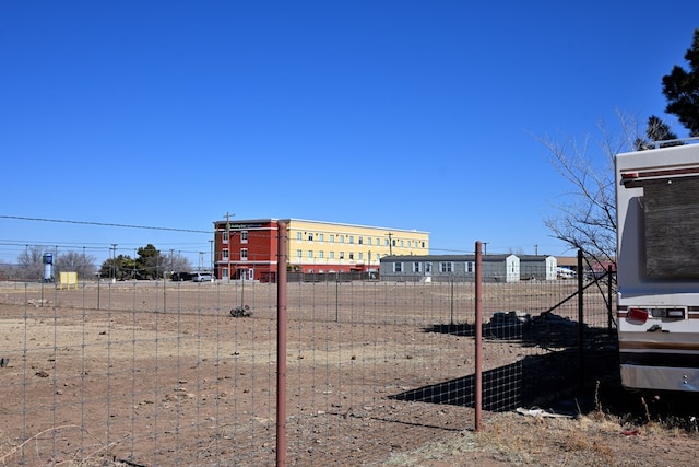 exterior details featuring fence