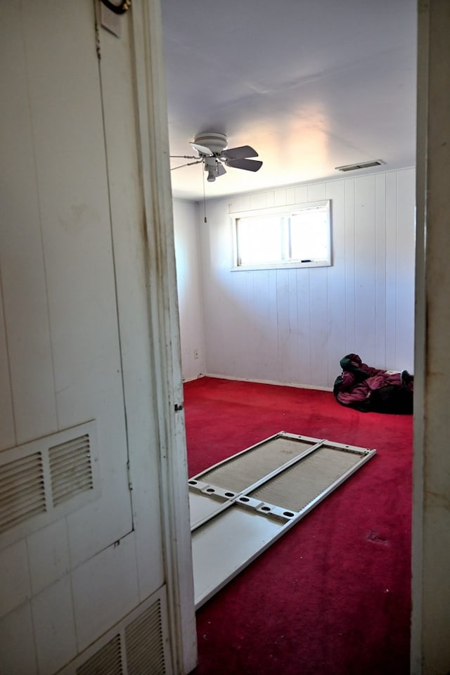 bedroom with ceiling fan and visible vents