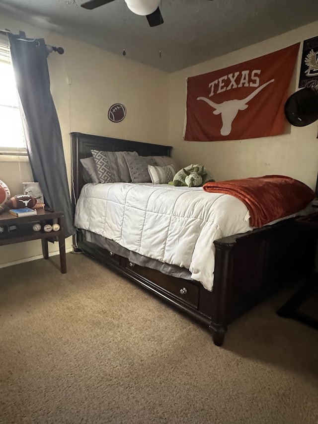 1001 Dorothea St, Crane, TX 79731 - carpeted bedroom featuring ceiling fan