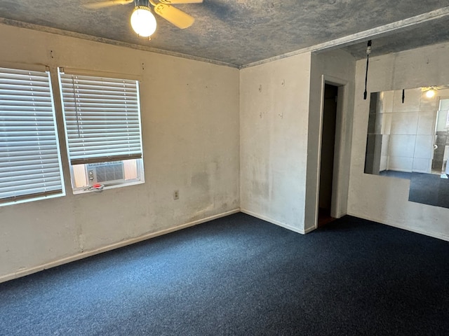 807 NW 5th St, Andrews, TX 79714 - spare room with carpet, a ceiling fan, and cooling unit
