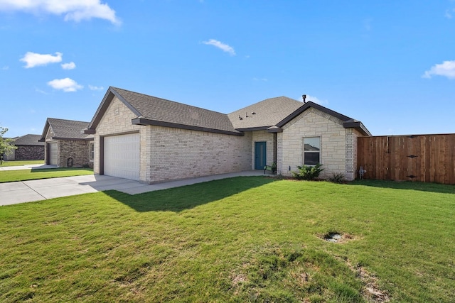 ranch-style home featuring roof with shingles, fence, an attached garage, brick siding, and driveway