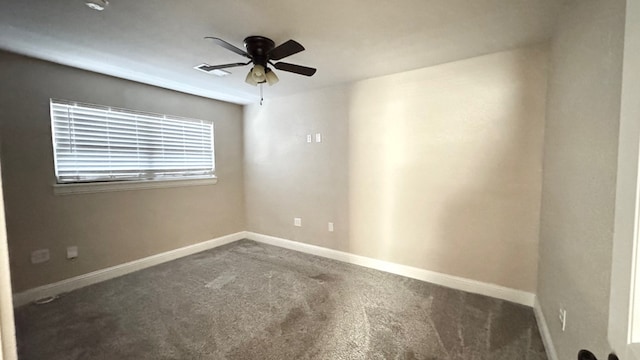 carpeted empty room featuring ceiling fan