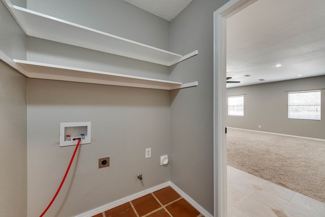 4503 Palmer Dr, Midland, TX 79705 - laundry room with washer hookup, electric dryer hookup, hookup for a gas dryer, tile patterned floors, and carpet floors
