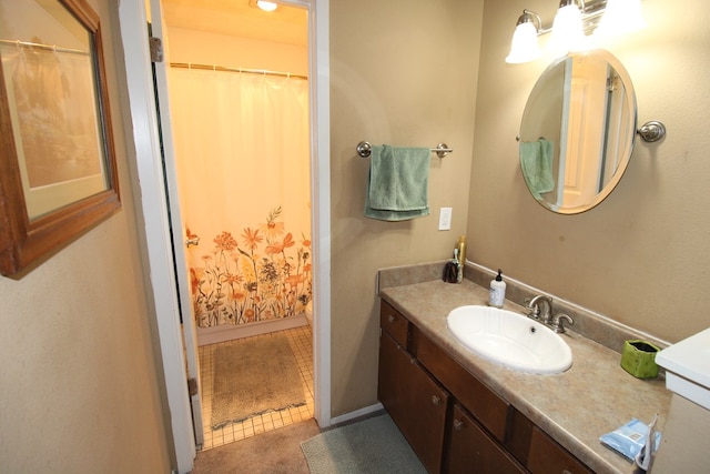 full bath with vanity and curtained shower