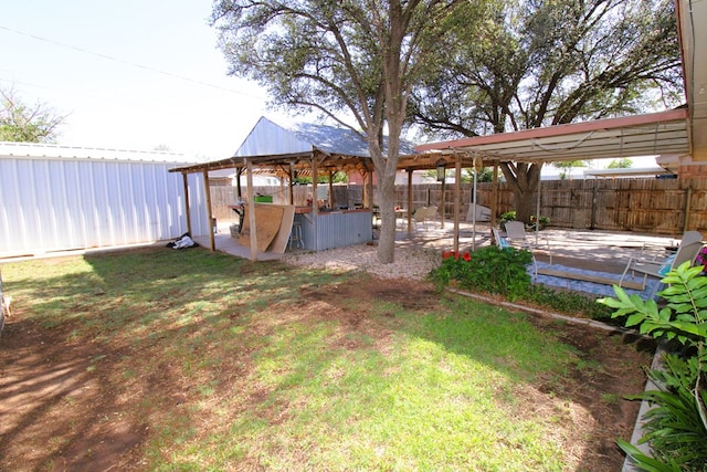 view of yard featuring a patio and a gazebo