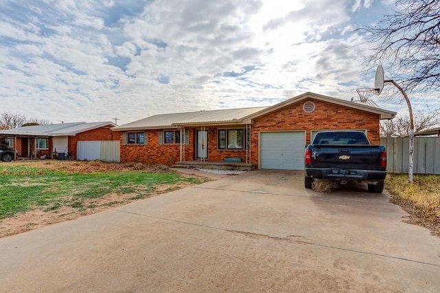 single story home with a garage