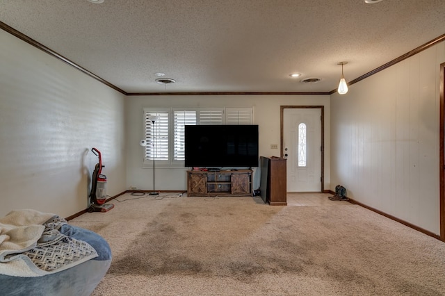 carpeted living room with a textured ceiling and crown molding