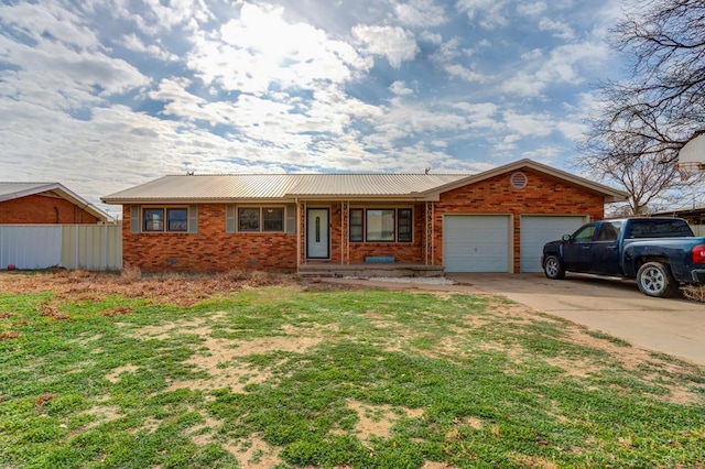 single story home featuring a garage