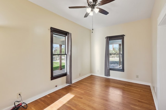 101 N 7th St, Marathon, TX 79842 - spare room featuring plenty of natural light, wood finished floors, ceiling fan, and baseboards