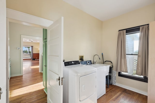 101 N 7th St, Marathon, TX 79842 - washroom with separate washer and dryer, wood finished floors, and baseboards