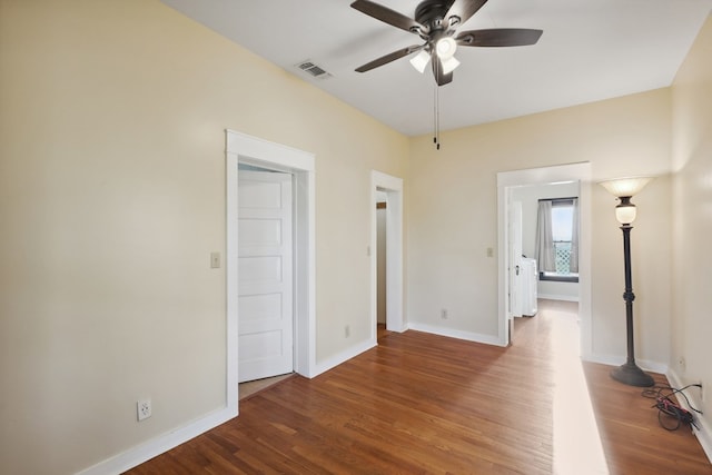 101 N 7th St, Marathon, TX 79842 - empty room with ceiling fan, wood finished floors, and baseboards