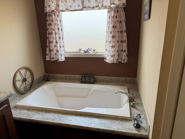 bathroom with a garden tub
