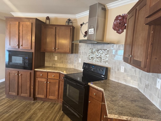 kitchen featuring ornamental molding, dark wood-type flooring, ventilation hood, backsplash, and black appliances