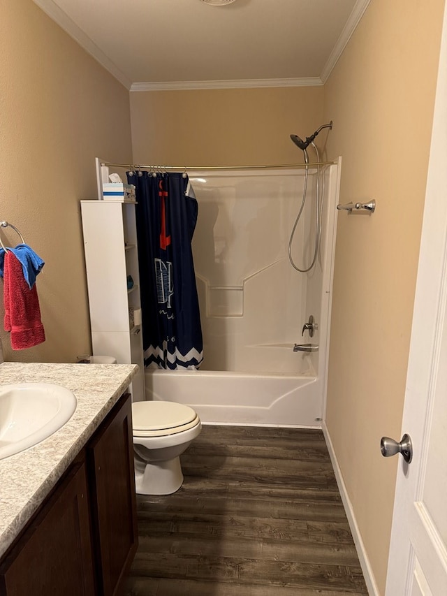 bathroom with ornamental molding, wood finished floors, shower / tub combo with curtain, and vanity