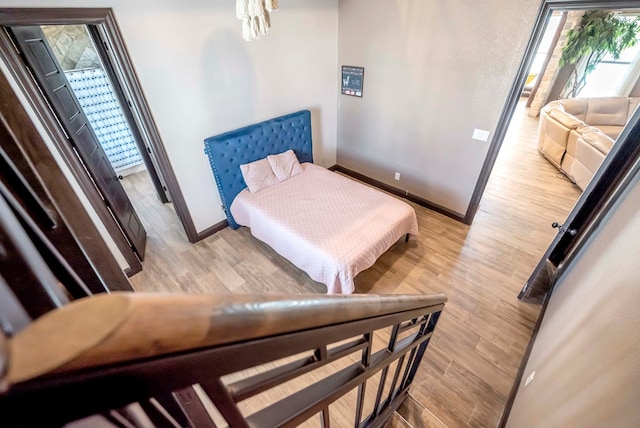 bedroom featuring light wood-type flooring