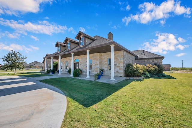 view of front of home with a front lawn