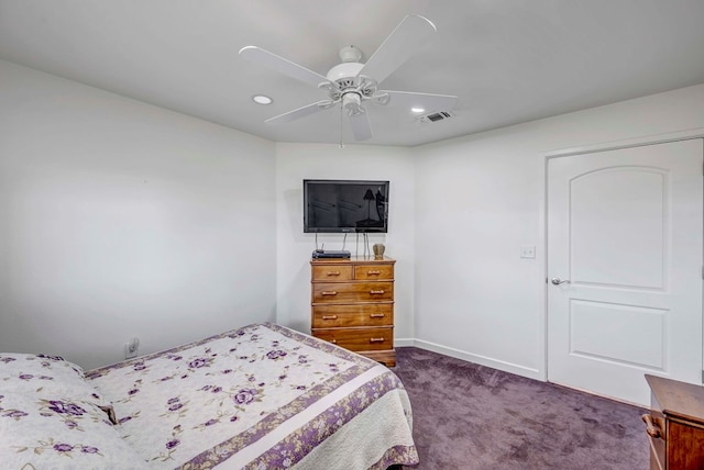 bedroom featuring dark colored carpet and ceiling fan