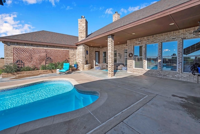 view of pool featuring a patio area