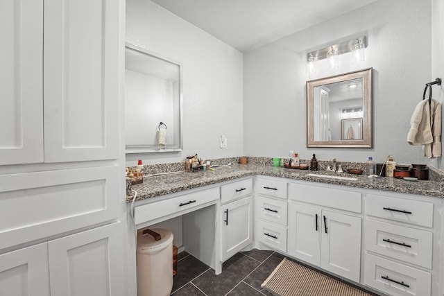 6338 Mecca St, Odessa, TX 79762 - bathroom with vanity and tile patterned flooring
