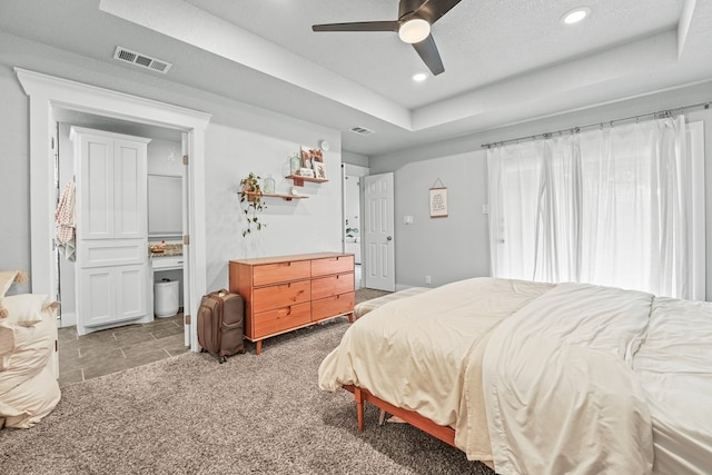 6338 Mecca St, Odessa, TX 79762 - carpeted bedroom featuring a raised ceiling, recessed lighting, and a ceiling fan