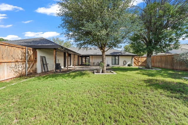 6338 Mecca St, Odessa, TX 79762 - rear view of property with a fenced backyard, brick siding, roof with shingles, and a patio