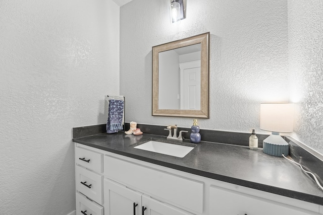 6338 Mecca St, Odessa, TX 79762 - bathroom featuring vanity and a textured wall