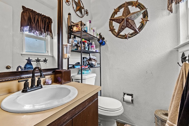 1703 Hemphill Ave, Odessa, TX 79763 - bathroom with toilet and vanity