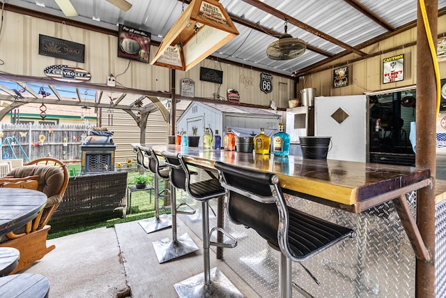 1703 Hemphill Ave, Odessa, TX 79763 - bar with wooden walls