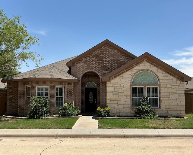 2804 Anice St, Odessa, TX 79762 - french country inspired facade with stone siding and brick siding
