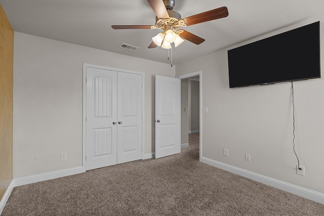 8901 Ratliff Ridge Ave, Odessa, TX 79765 - unfurnished bedroom with carpet flooring, a closet, and a ceiling fan