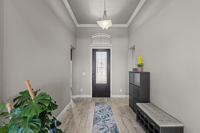 8620 Rutland Dr, Odessa, TX 79765 - entrance foyer featuring crown molding, light wood-style floors, and a high ceiling