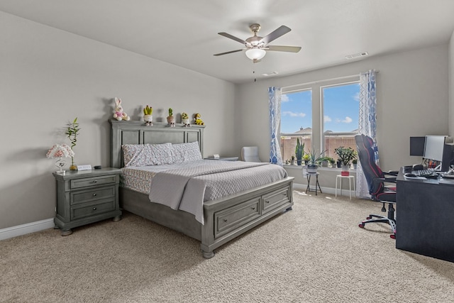 8620 Rutland Dr, Odessa, TX 79765 - bedroom featuring light colored carpet, a desk, and a ceiling fan