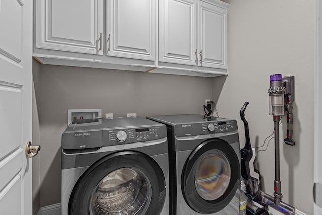 8620 Rutland Dr, Odessa, TX 79765 - laundry room with cabinet space and separate washer and dryer