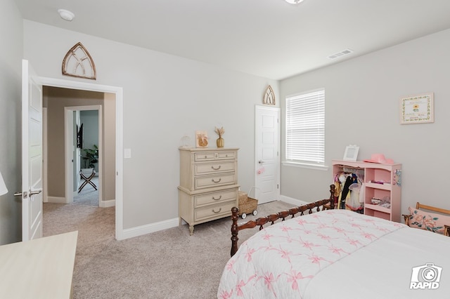 bedroom with visible vents, baseboards, and carpet floors