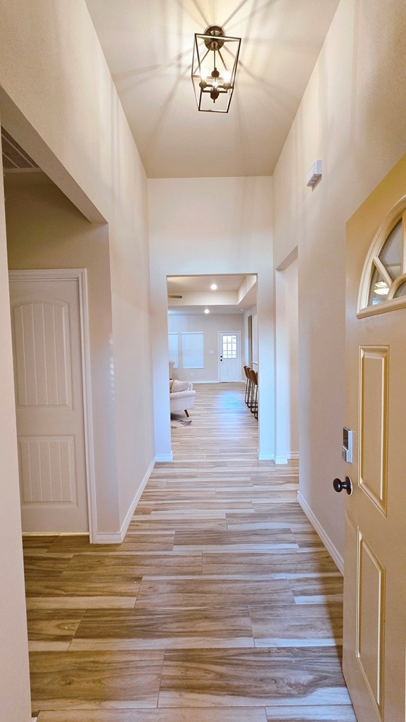 3630 El Cajon Ave, Odessa, TX 79765 - corridor with wood finished floors and baseboards