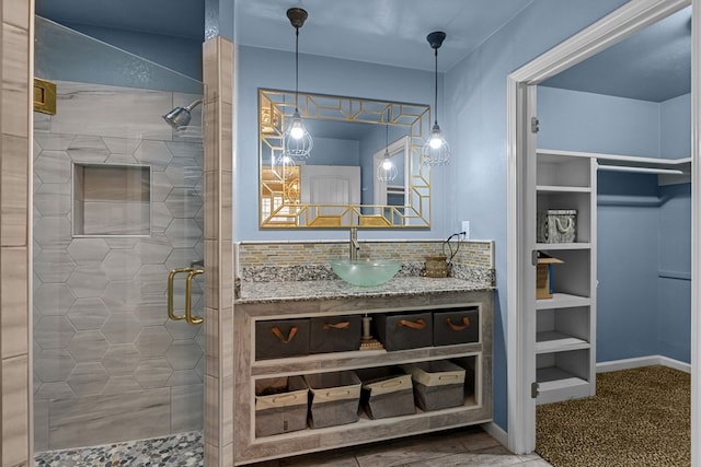 2900 E 21st St, Odessa, TX 79761 - full bath featuring a shower stall, decorative backsplash, and vanity