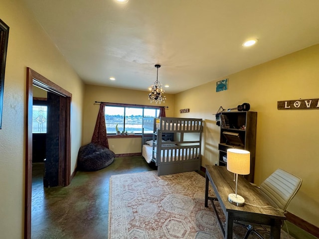 bedroom with an inviting chandelier and concrete floors