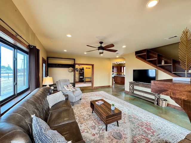 living room with ceiling fan