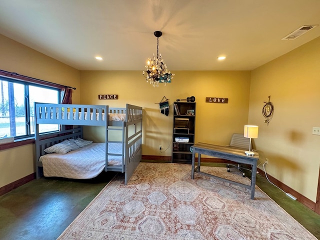 bedroom with a notable chandelier