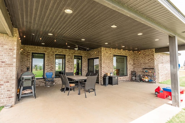 479 County Rd 306, Seminole, TX 79360 - view of patio featuring outdoor dining area and ceiling fan