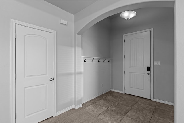 2208 Boise Dr, Odessa, TX 79762 - mudroom featuring arched walkways and baseboards